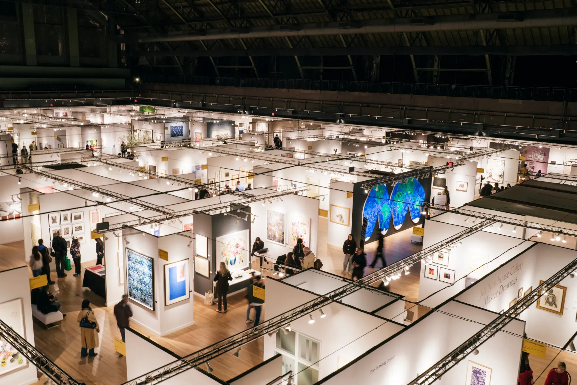 A perched overlook of the 2026 Fair at the Park Avenue Armory featuring "It's Yours" by Hank Willis Thomas